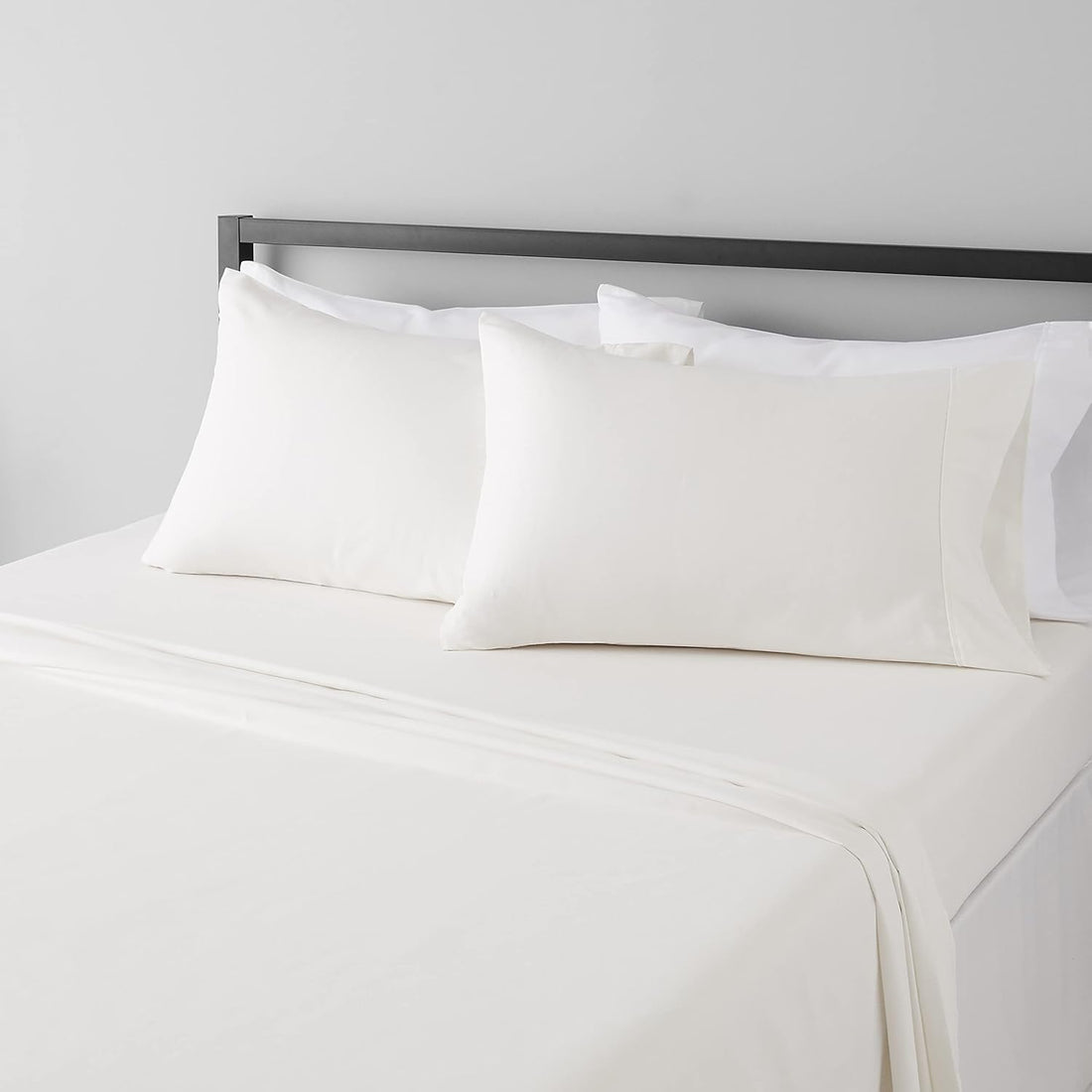 Amazon Basics Breathable, Ultra-Soft, Wrinkle-Free, Machine Washable Microfiber 4 Piece Bed Sheet Set with 14-Inch Deep Pockets, King, Cream, Solid