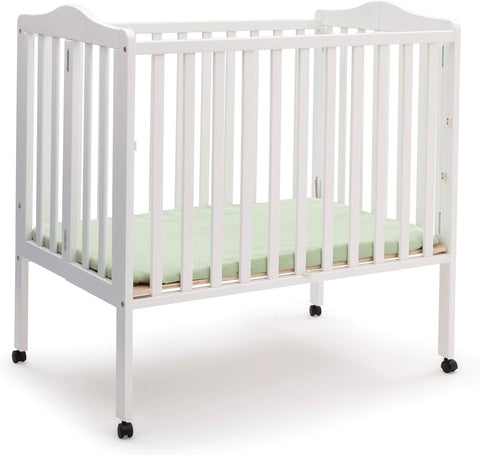 Delta Children Folding Portable Mini Baby Crib with 1.5-inch Mattress - Greenguard Gold Certified, White