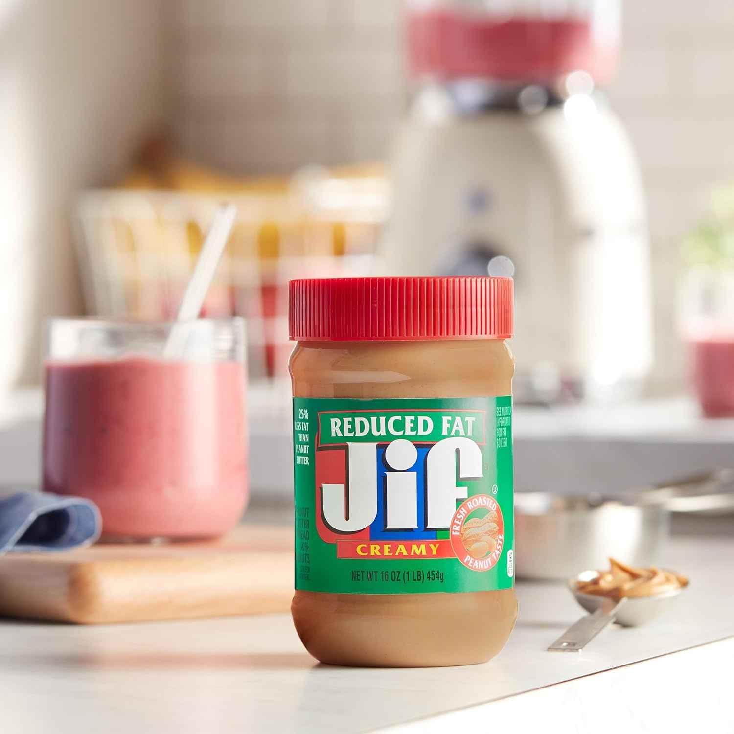 Jif Reduced Fat Creamy Peanut Butter, 16 oz Jar | 12-count bulk case, smooth peanut butter spread, 7g of protein per serving, ideal for sandwiches, snacking and baking
