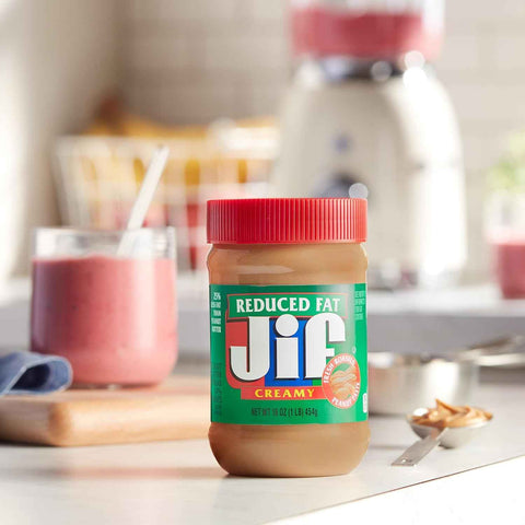 Jif Reduced Fat Creamy Peanut Butter, 16 oz Jar | 12-count bulk case, smooth peanut butter spread, 7g of protein per serving, ideal for sandwiches, snacking and baking