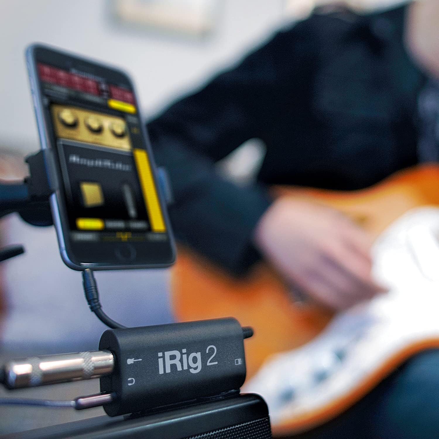 IK Multimedia iRig 2 portable guitar audio interface, lightweight audio adapter for iPhone and iPad with instrument input and headphone/amplfier outs
