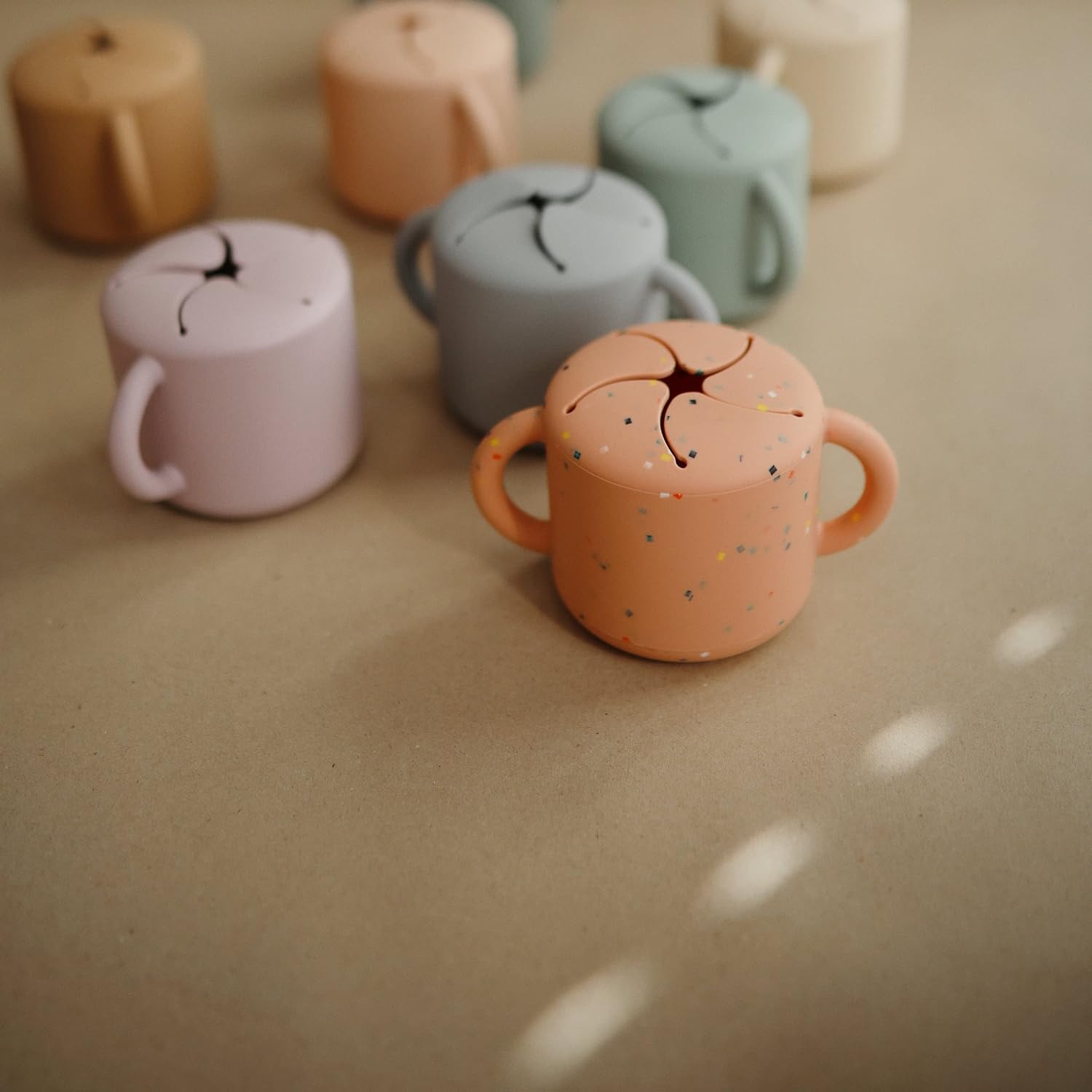 mushie Silicone Snack Cup | Spill Proof Food Container (Powder Pink Confetti)