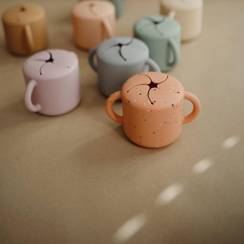 mushie Silicone Snack Cup | Spill Proof Food Container (Powder Pink Confetti)