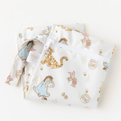 Bumkins - Disney - Waterproof Wet Bag - For Baby, Travel, Swim Suit, Cloth Diapers, Pump Parts, Pool, Gym, Toiletry, Strap to Stroller - Reusable & Easy to Clean - 2pk - Winnie & Friends
