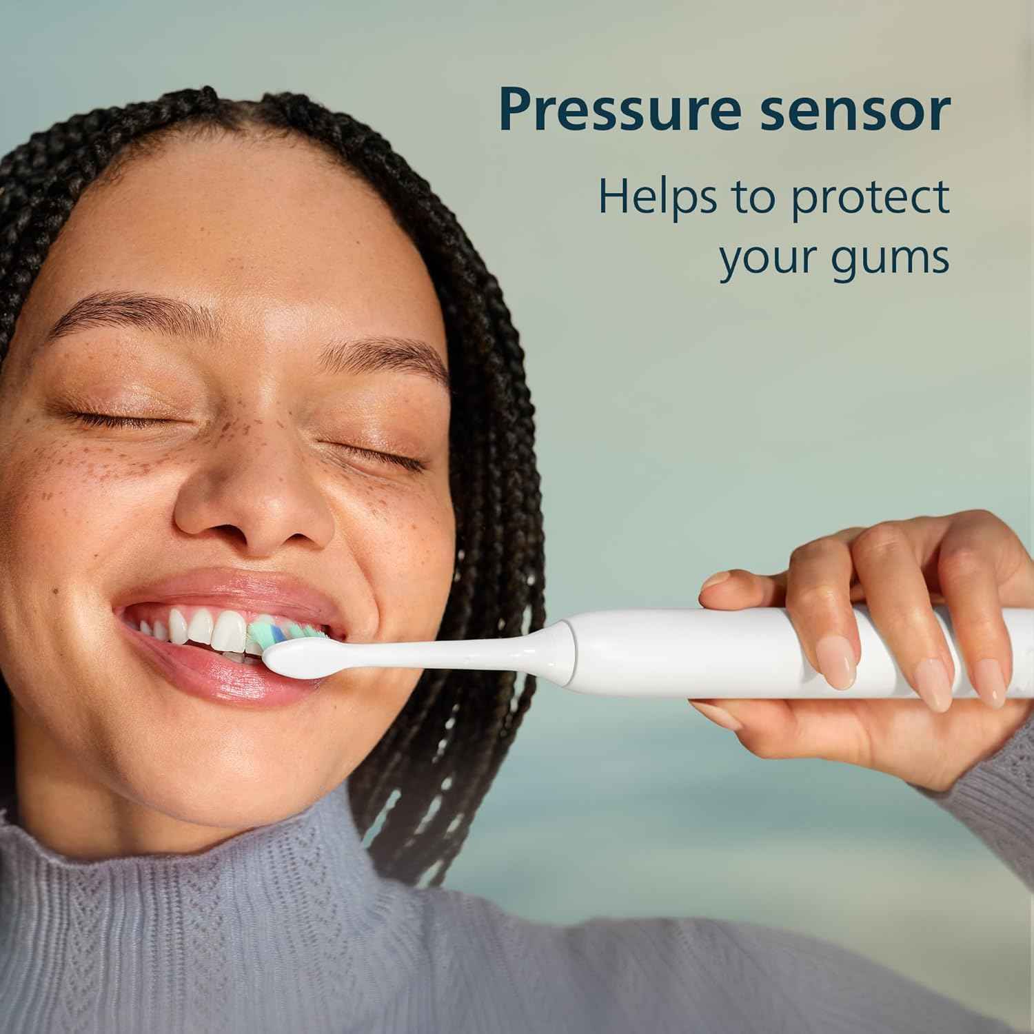 Philips Sonicare 4100 Rechargeable Electric Toothbrush, 1 Brush Head, Black | 700% More Plaque Removal¹, Pressure Sensor, 2 Brush Settings, 2-Minute Guided Timer, 14-Day Battery, HX3681/24