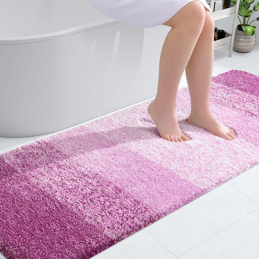 OLANLY Bathroom Rug Mat 70x24, Extra Soft and Absorbent Microfiber Bath Rugs, Non-Slip Plush Shaggy Bath Carpet Runner, Machine Wash Dry, Bath Mats for Bathroom Floor, Tub and Shower, Pinkish-Purple