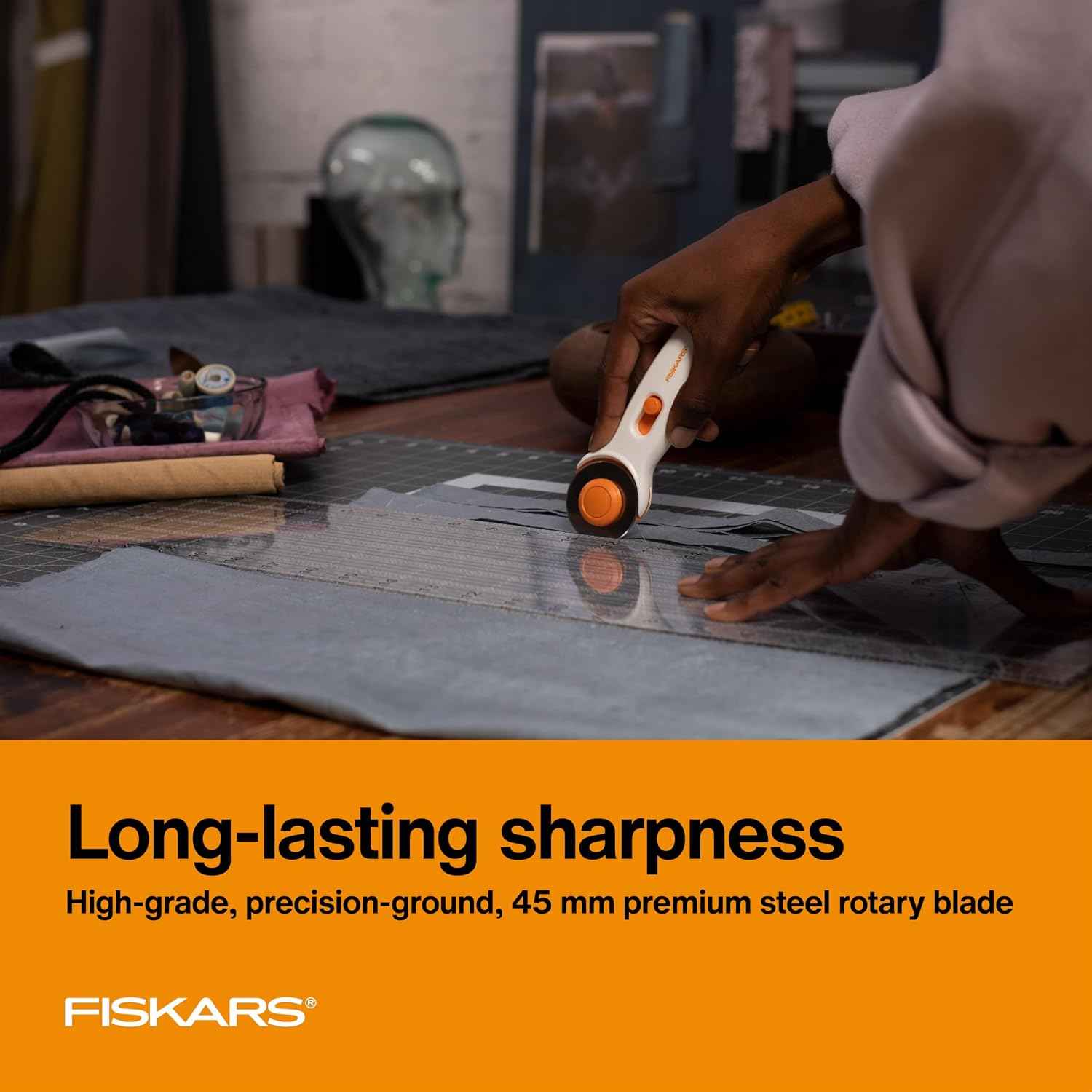 Fiskars 45mm Rotary Cutter for Fabric, Premium Steel Stick Fabric Cutter Cuts Through Multiple Layers, Right and Left Handed, Easy and Safe Blade Change, Arts and Crafts, Sewing and Quilting Tools