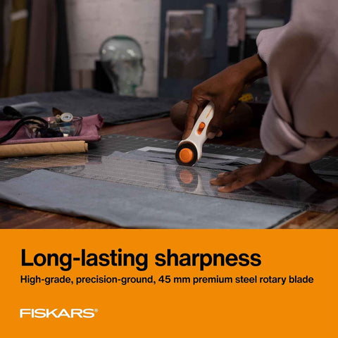 Fiskars 45mm Rotary Cutter for Fabric, Premium Steel Stick Fabric Cutter Cuts Through Multiple Layers, Right and Left Handed, Easy and Safe Blade Change, Arts and Crafts, Sewing and Quilting Tools