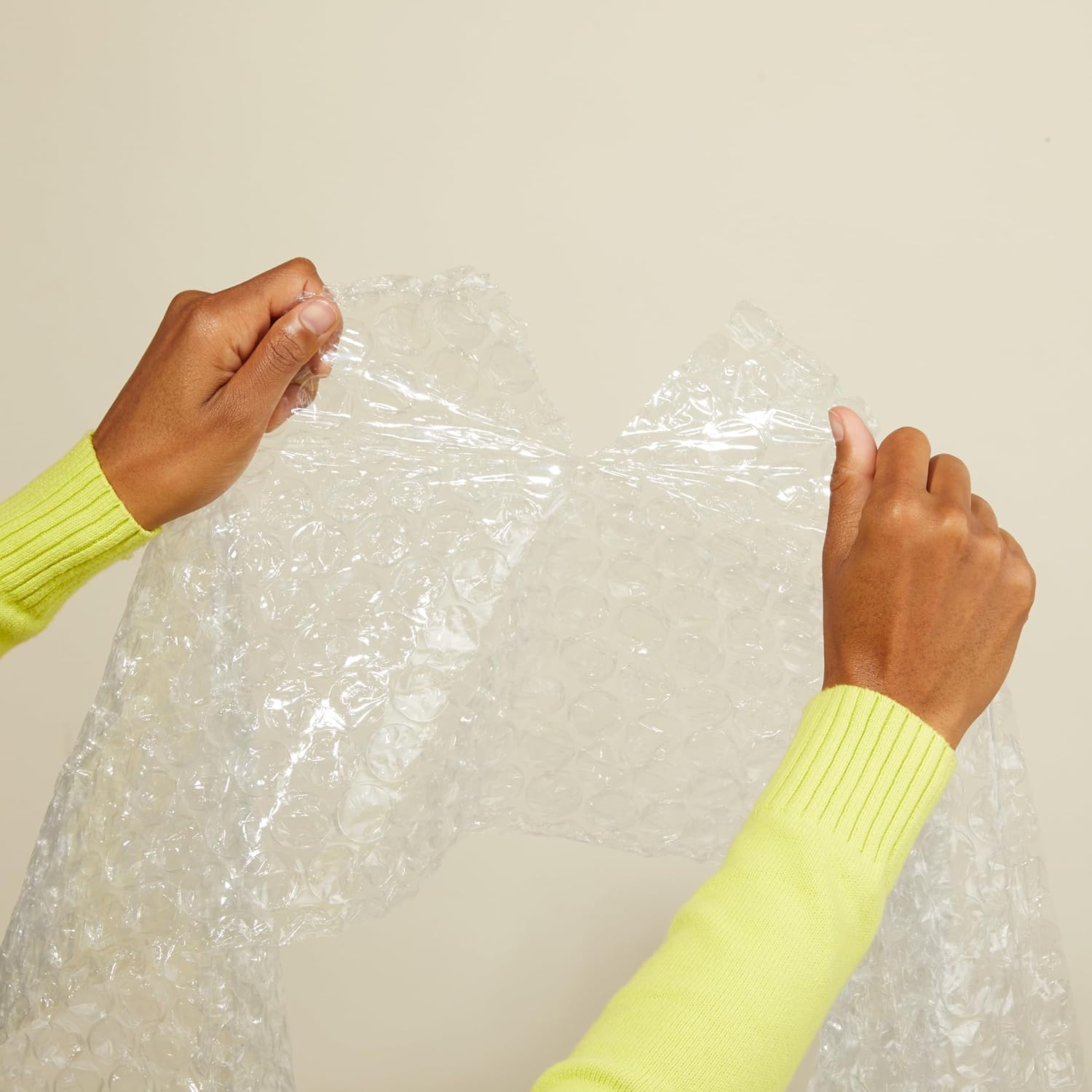 Amazon Basics Bubble Cushioning Wrap for Moving, Packing, Shipping and Storage, Heavy Duty Protection for Fragile Items, 12-inch x 100-foot Long Roll, Large 5/16", Clear