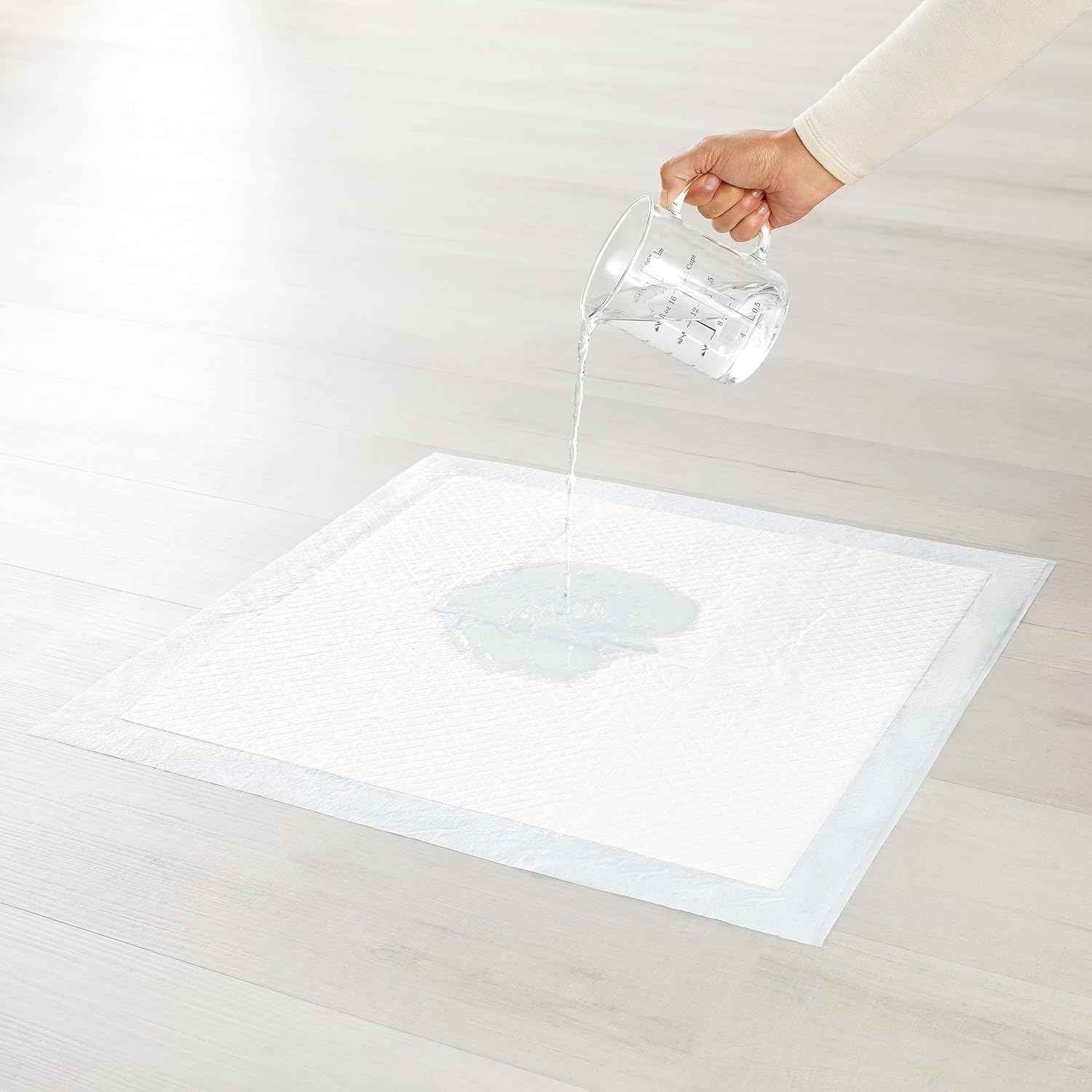 Amazon Basics Disposable Dog Training Pads with Quick-Dry Surface that Turns Liquid into Gel, XL, 34 x 28 Inches, 15-Pack