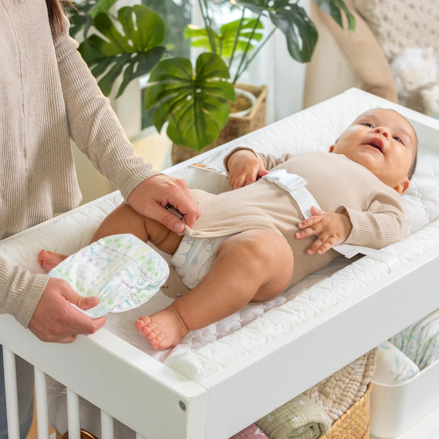 Ingenuity Contoured Changing Pad – Includes Waterproof Changing Liner and Safety Fastening Strap with Quick-Release Buckle