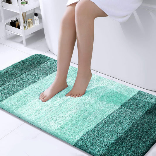 OLANLY Bathroom Rug Mat 47x24, Extra Soft and Absorbent Microfiber Bath Rugs, Non-Slip Plush Shaggy Bath Carpet, Machine Wash Dry, Bath Mats for Bathroom Floor, Tub and Shower, Blackish Green